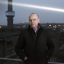 Portrait of Anthony McCall, taken during the installation of Crossing the Elbe, Hamburg, 2013.